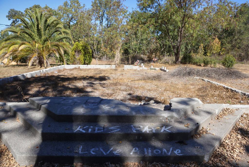The foundation of a structure still remains on a property that the Santa Rosa City Council approved for a community park along Roseland Creek, at Burbank Avenue, in Santa Rosa on Thursday, September 30, 2021.  (Christopher Chung/ The Press Democrat)