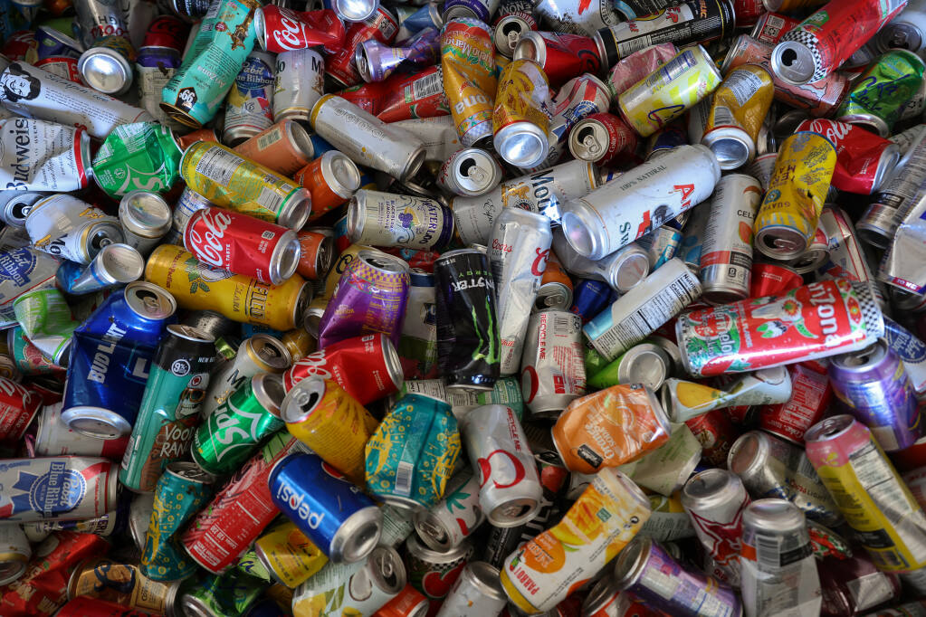 Aluminum cans in a recycling dumpster at the Novato Recycling Center in Novato on Friday, August 26, 2022.  (Christopher Chung/The Press Democrat)