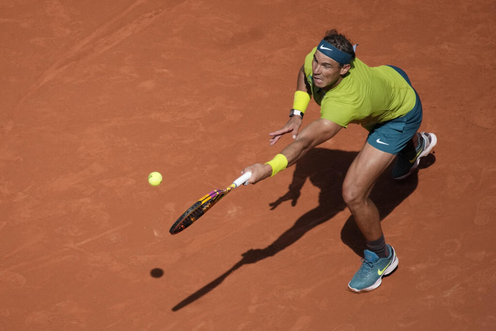 Spain's Rafael Nadal plays a shot against Norway's Casper Ruud the French Open tennis tournament in Roland Garros stadium in Paris, France, Sunday, June 5, 2022. (AP Photo/Christophe Ena)