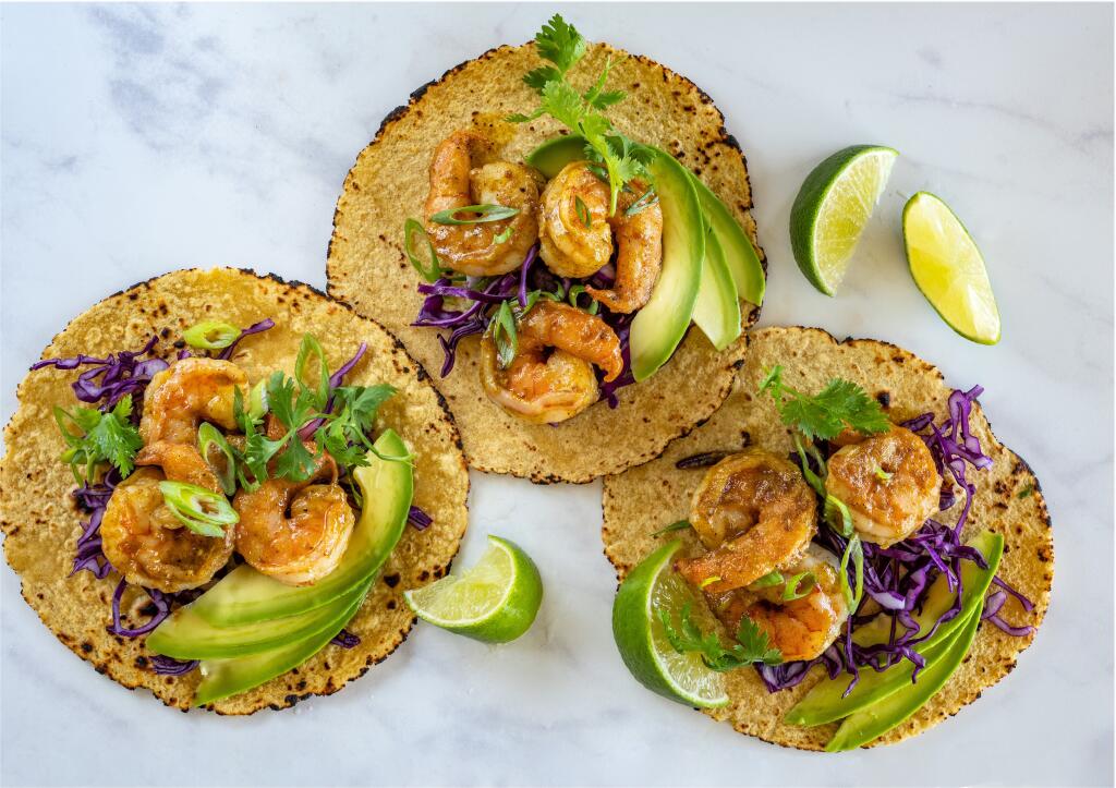 Pistachio Butter Basted Shrimp Tacos from the cookbook “Pistachio: Savory & Sweet Recipes Inspired by World Cuisines.” (Robert Holmes)