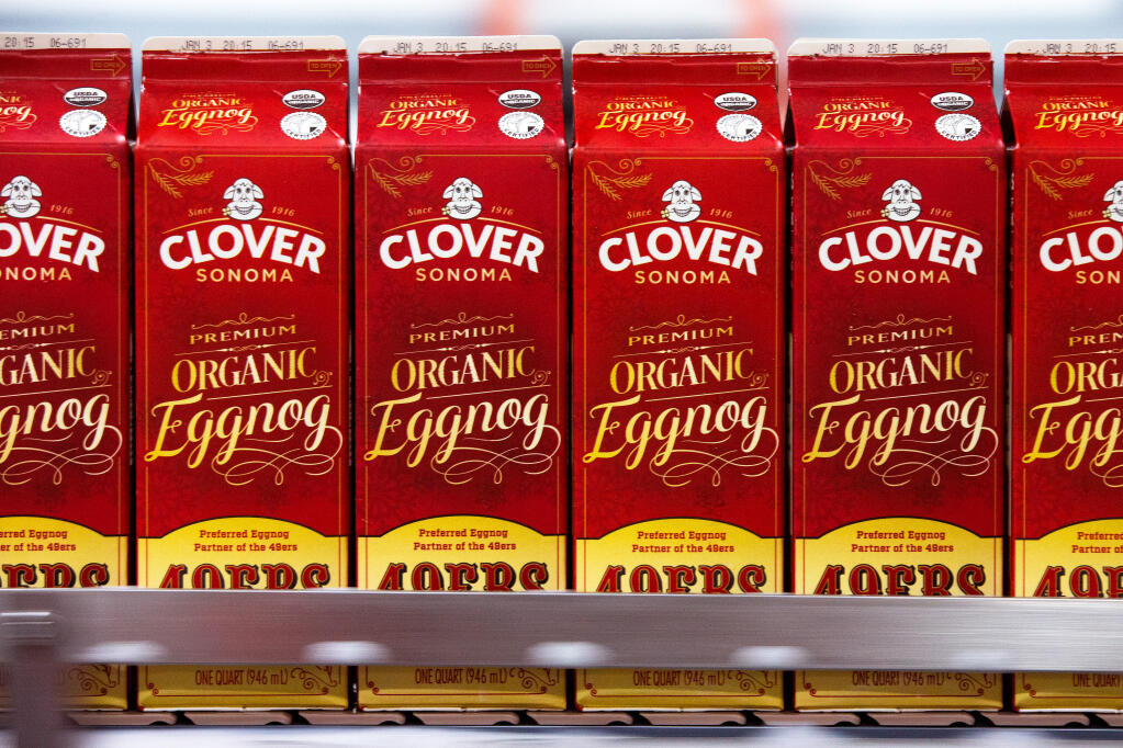 One quart cartons of Clover Sonoma premium organic eggnog roll along a conveyor belt at the Clover Sonoma bottling plant in Petaluma, California, on Thursday, Dec. 10, 2020. (Alvin A.H. Jornada / The Press Democrat)
