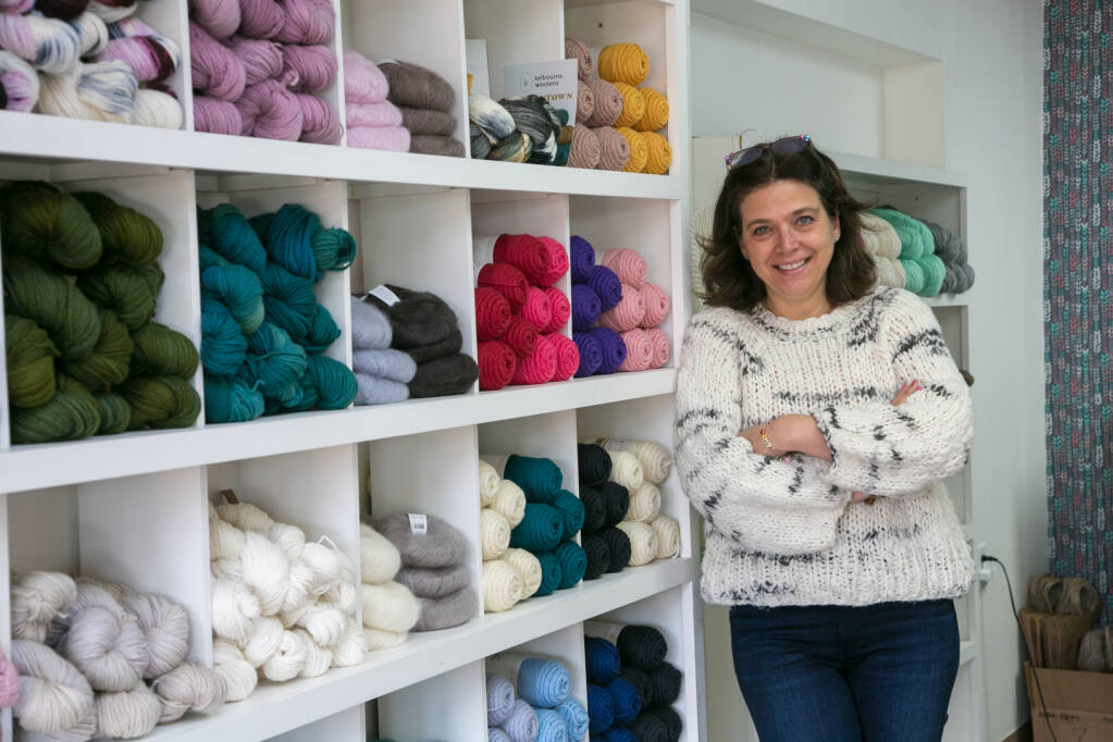Marie Utnehmer in her yarn and community knitting store, Noma Knits at 730 W. Napa St. on  Feb. 17. She is wearing a hand-knit sweater, of course. (Photo by Julie Vader/special to the Index-Tribune)