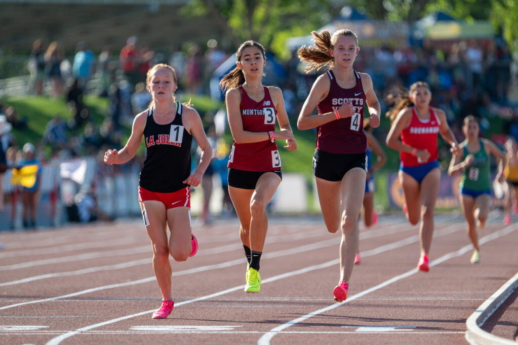 Montgomery's Hanne Thomsen, second from left, compete in the 1,600-meter race during Friday's preliminaries at the CIF state track and field championships in Clovis. (Brian Tucker / For The Press Democrat)