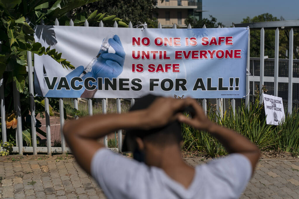 Signs encouraging vaccinations outside the Pfizer South Africa headquarters in Johannesburg in March. A new strain of COVID-19, called the omicron variant, has been identified in South Africa. (JOAO SILVA / New York Times)