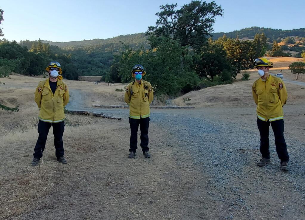 Mendocino College wildland firefighting training graduates work in Boonville. From left, Gerald Hopper, Grant Armstrong and Joel Slates. July 2020 (Photo courtesy Mendocino College)