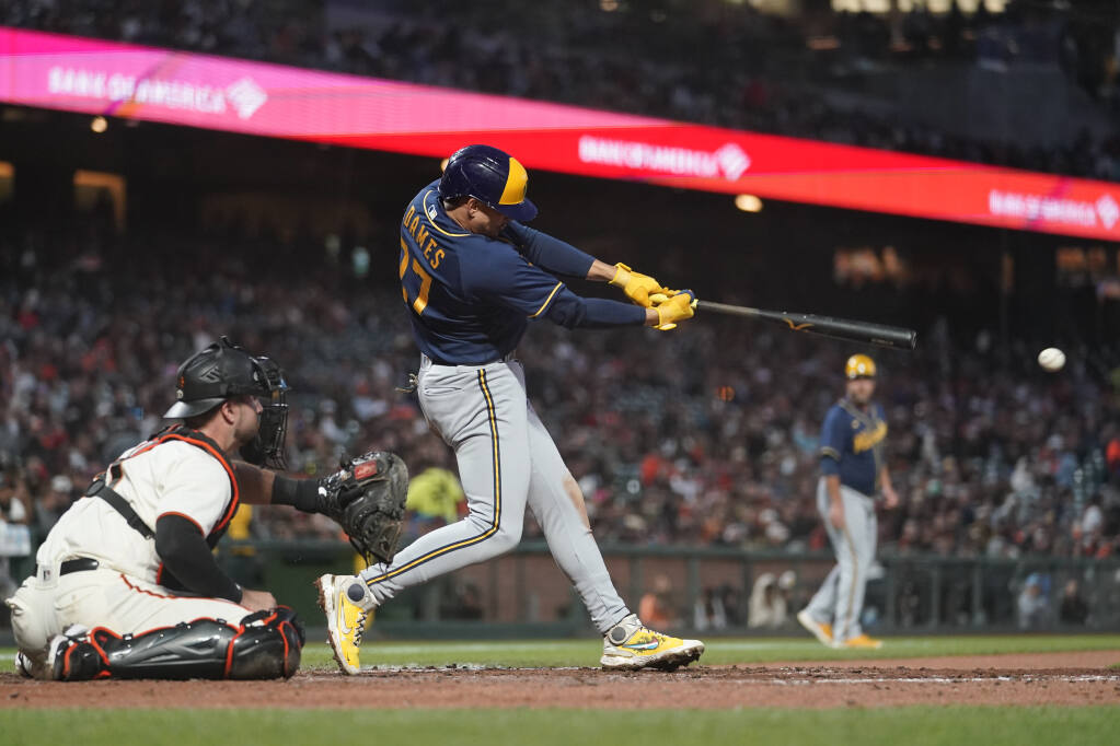 The Milwaukee Brewers’ Willy Adames hits an RBI single against the Giants during the sixth inning in San Francisco, Thursday, July 14, 2022. (Godofredo A. Vásquez / ASSOCIATED PRESS)